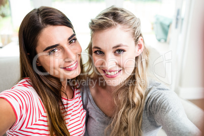 Portrait of pretty young female friends