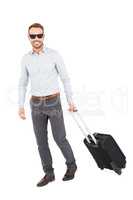 Young man with trolley bag