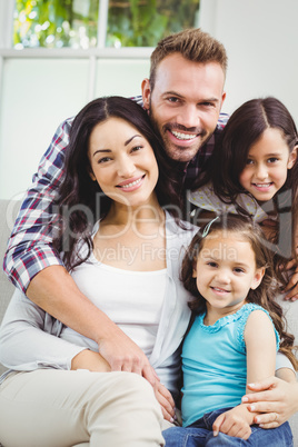 Portrait of smiling family with daughters