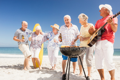 Senior friends having a barbecue