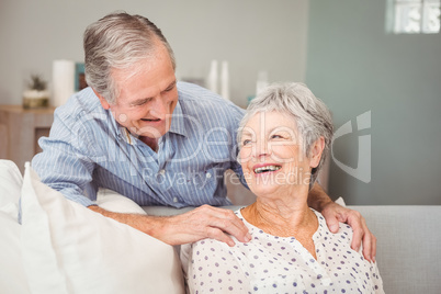 Romantic senior man with his wife at home