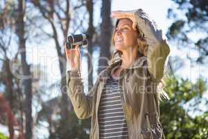 Woman holding binoculars