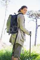 Woman with hiking sticks
