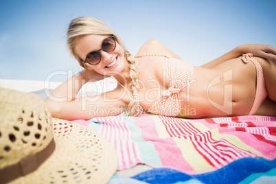 Pretty woman lying on the beach