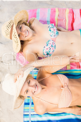 Portrait of women lying on the beach Portrait of women lying on the beach