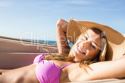 Woman lying in hammock