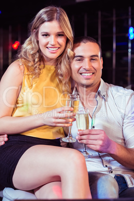 Smiling couple with champagne