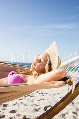 Woman lying in hammock
