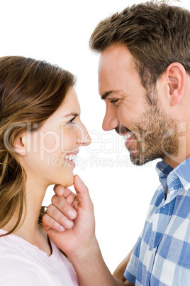 Happy young couple looking at each other and smiling