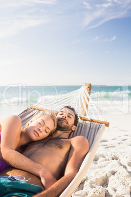 Couple lying in hammock