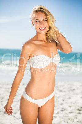Woman posing at the beach