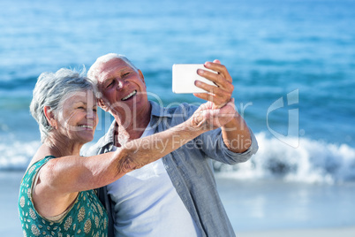 Senior couple taking a selfie Senior couple taking a selfie