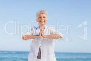 Senior woman doing yoga