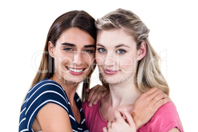 Portrait of smiling female friends hugging