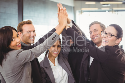 Businesspeople hands stacked over each other