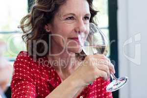 Close-up of woman having wine