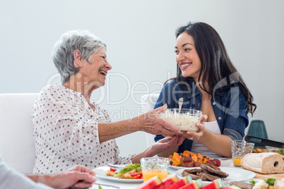 Happy family having breakfast