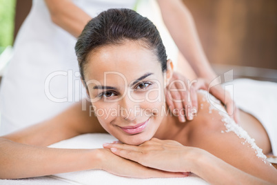 Beautiful young woman receiving spa treatment