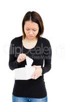 Woman taking a tissue from tissue box