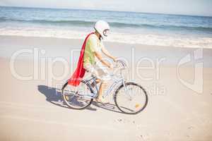 Senior superhero riding bike