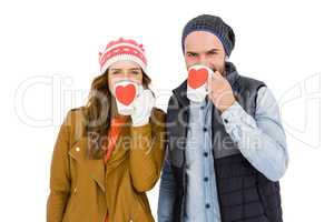 Happy young couple having coffee