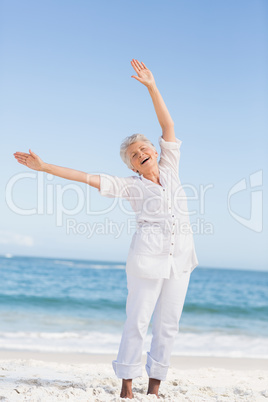 Senior woman relaxing on the beach