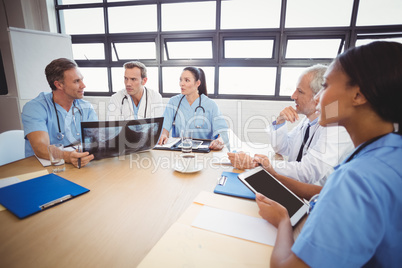 Medical team interacting in conference room