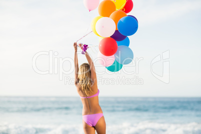 Beautiful woman holding balloon