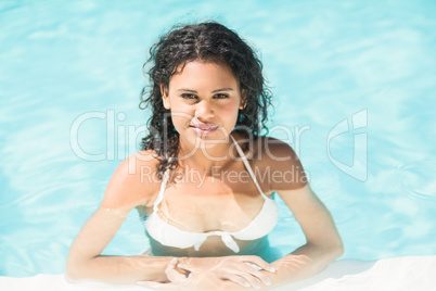 Portrait of beautiful woman in swimming pool