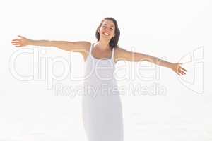 Beautiful woman stretching on the beach