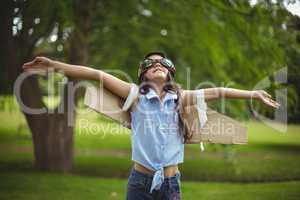 Young girl pretending to fly