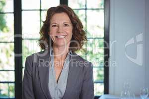 Smiling businesswoman posing