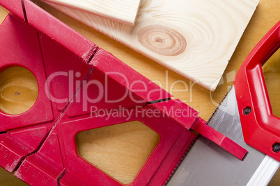 Cutting boards using the miter box and saw.