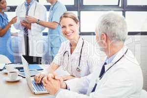 Medical team interacting in conference room