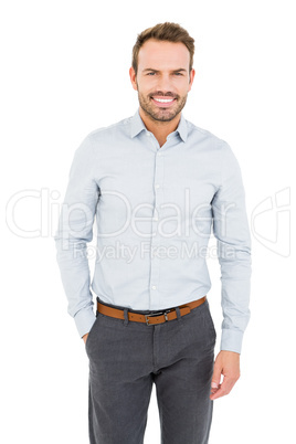 Well dressed young man smiling at camera