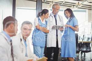 Group of doctors discussing in hospital