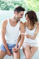 Happy couple with pregnancy test
