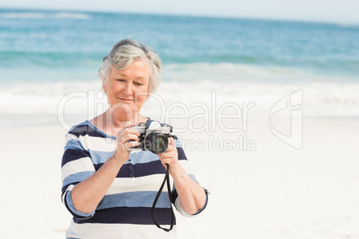 Senior woman taking picture