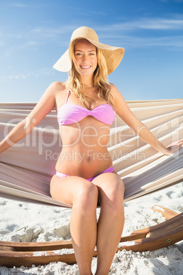 Woman sitting in hammock