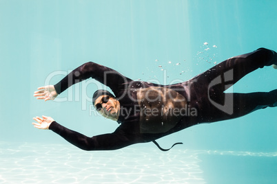 Portrait of young man swimming