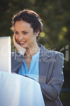 Businesswoman using laptop