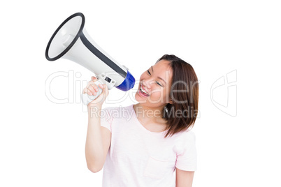 Young woman talking on horn loudspeaker
