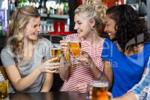 Happy friends having a drink