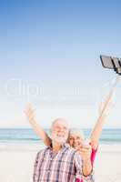 Senior couple taking selfie