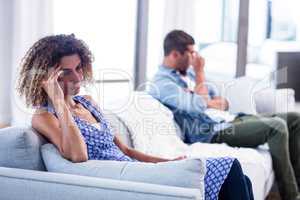 Upset young couple ignoring each other