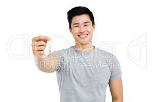 Happy man showing house key