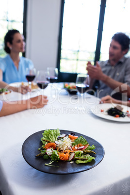 Plate of salad on the restaurant table