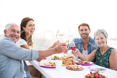 Happy family having a picnic at the beach