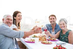 Happy family having a picnic at the beach