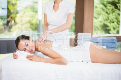 Young woman receiving massage